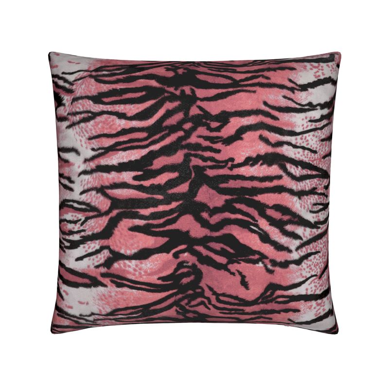 Pink and black zebra print pillow on a white background